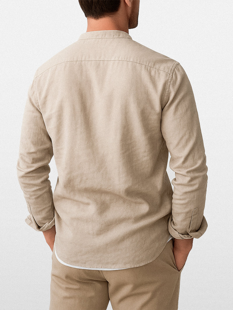 Raw jute linen shirt for men with structured mandarin collar, full front closure and soft silhouette — refined neutral tone for understated elegance.