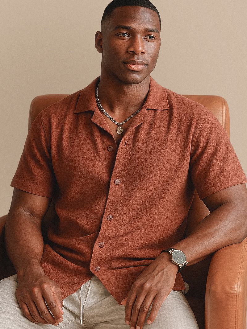 Terracotta Cuban collar shirt with quarter zip and soft knit texture — lightweight structure for summer refinement.