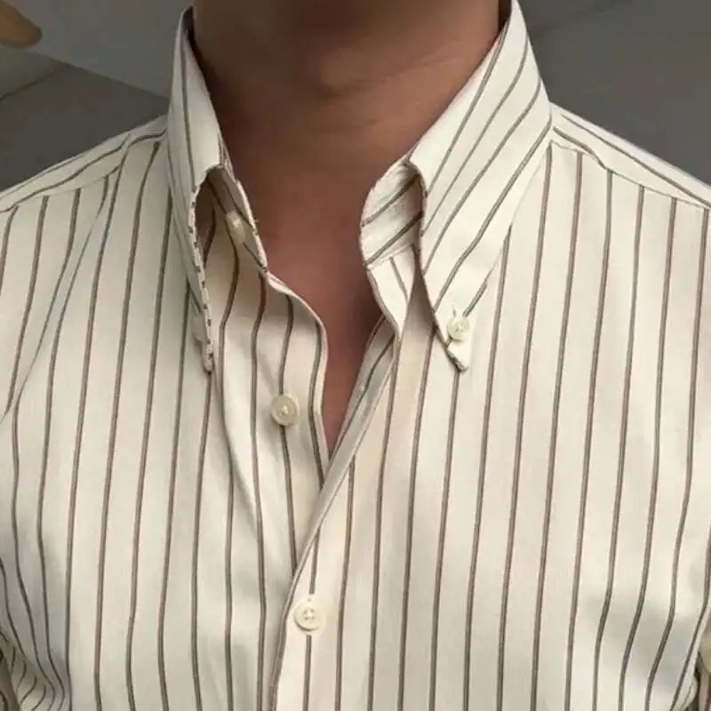 Striped formal shirt with classic structured collar and long sleeves — elegant broadcloth fabric with timeless vertical pattern.