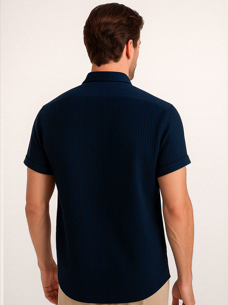 Navy blue short sleeve t-shirt with button-up front and breathable polyester texture — clean silhouette with subtle structure.