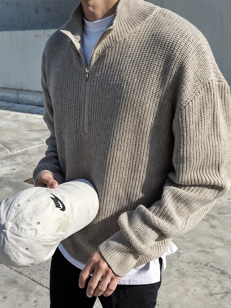 Gray structured pullover sweater with heavyweight knit and clean neckline — mid-season layering piece with refined everyday comfort.