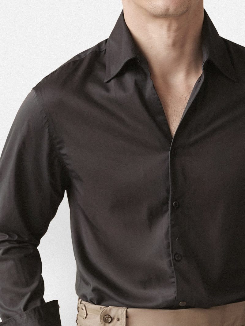 Black casual shirt with structured collar and smooth broadcloth finish — versatile staple with discreet presence.