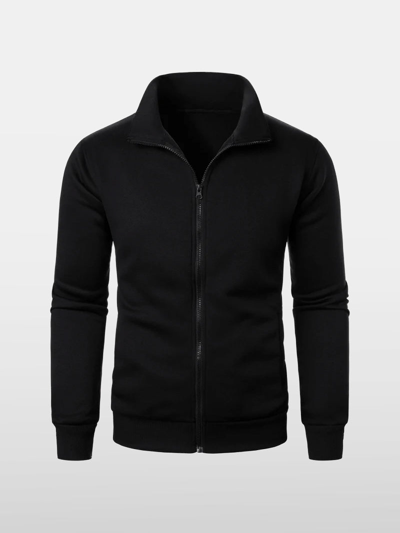 Black knitted zip sweater with structured collar and lined interior — versatile silhouette with subtle authority and discreet comfort.