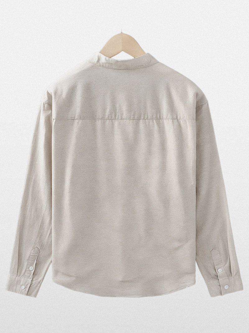 Raw jute linen shirt for men with structured mandarin collar, full front closure and soft silhouette — refined neutral tone for understated elegance.