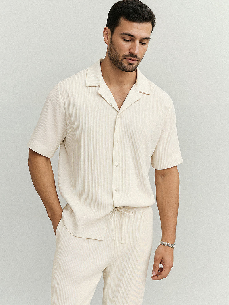 White striped summer set for men with short sleeve shirt and elastic waist pants — light fabric and notched collar for elegant leisure.
