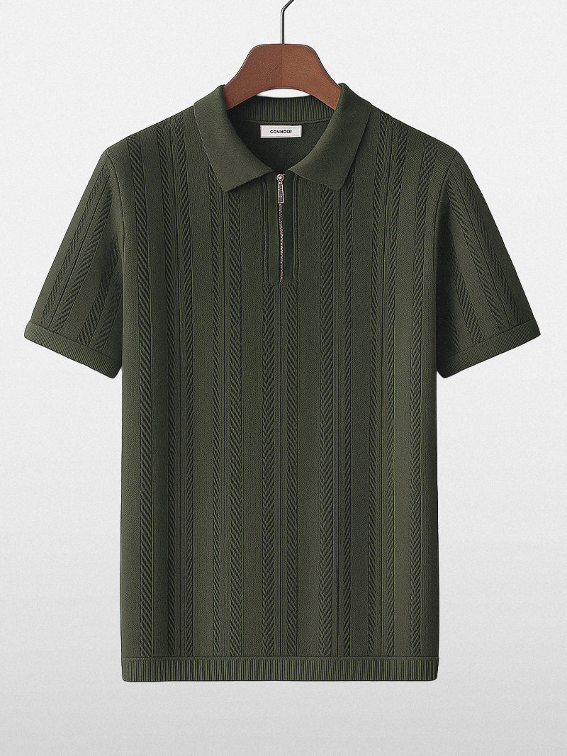 Dark green knit polo shirt with front zipper and structured collar — breathable lightweight design with quiet authority.
