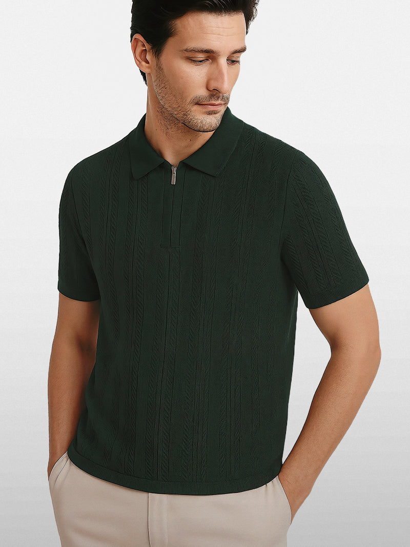 Dark green knit polo shirt with front zipper and structured collar — breathable lightweight design with quiet authority.