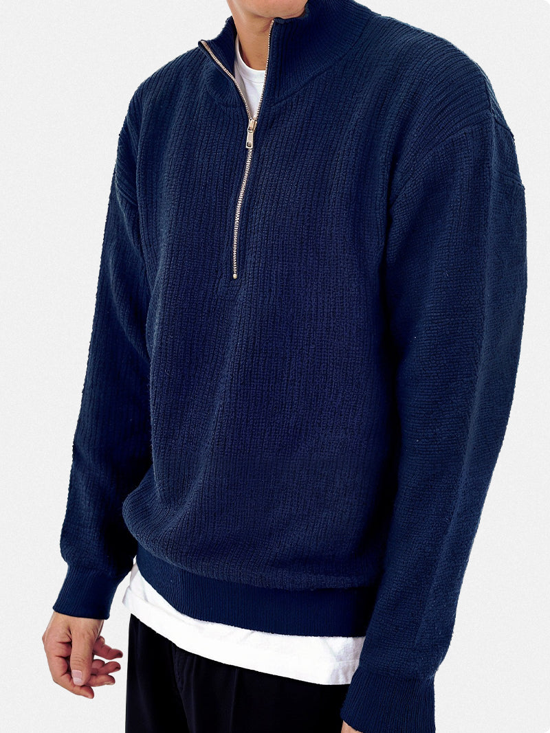 Navy blue sweater shirt with thick knit texture and minimalist structure — quiet layering option for cooler days.