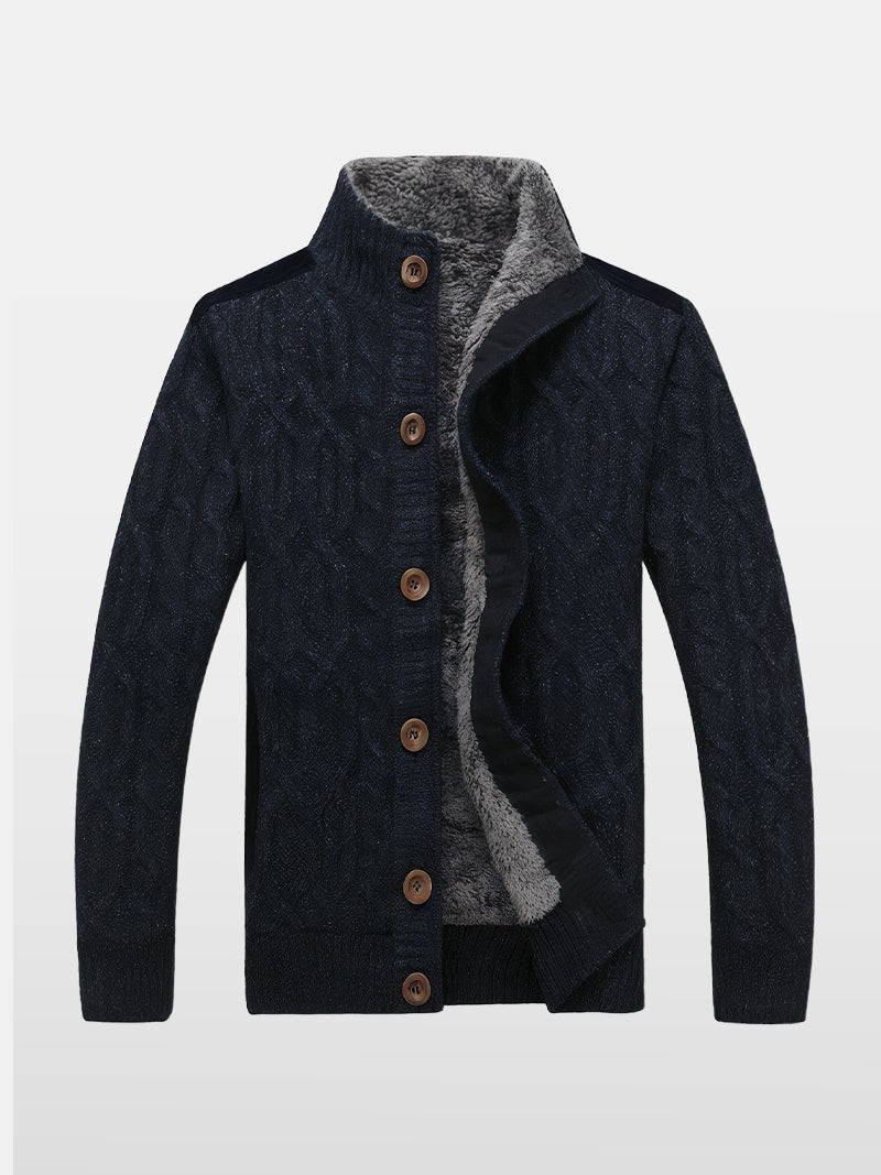Dark blue knit jacket with structured neckline and wool-blend lining — refined texture and sleek tailoring for modern understated style.