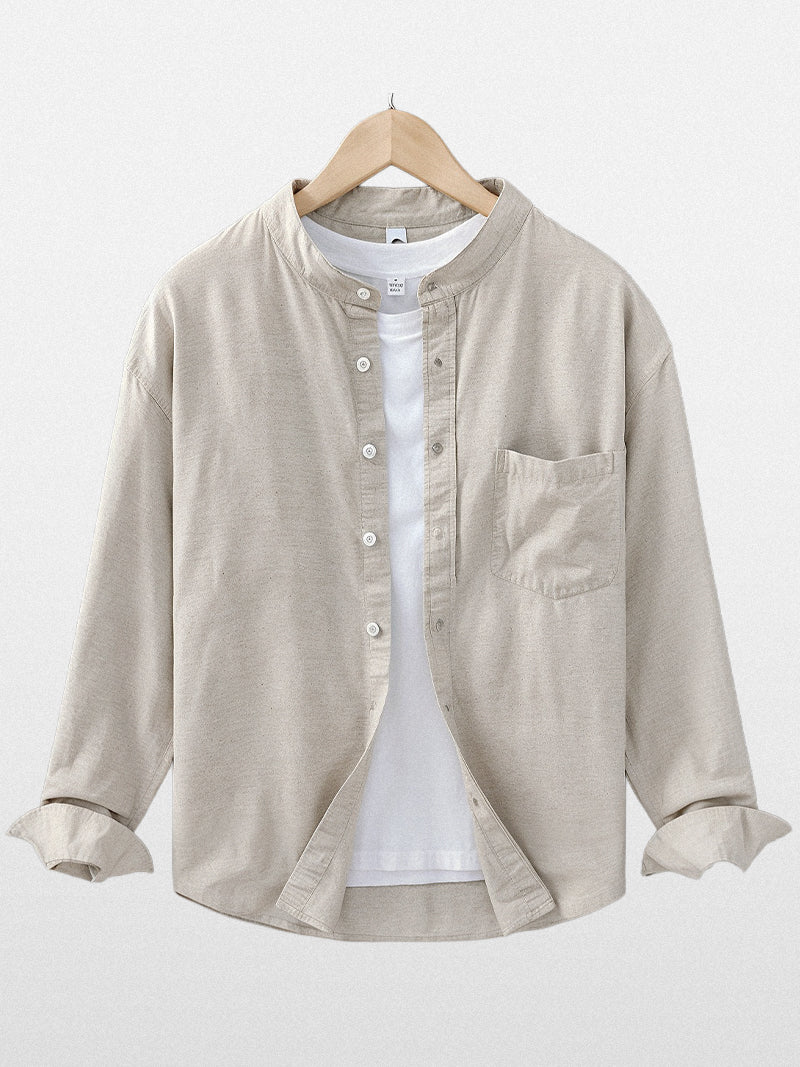 Raw jute linen shirt for men with structured mandarin collar, full front closure and soft silhouette — refined neutral tone for understated elegance.