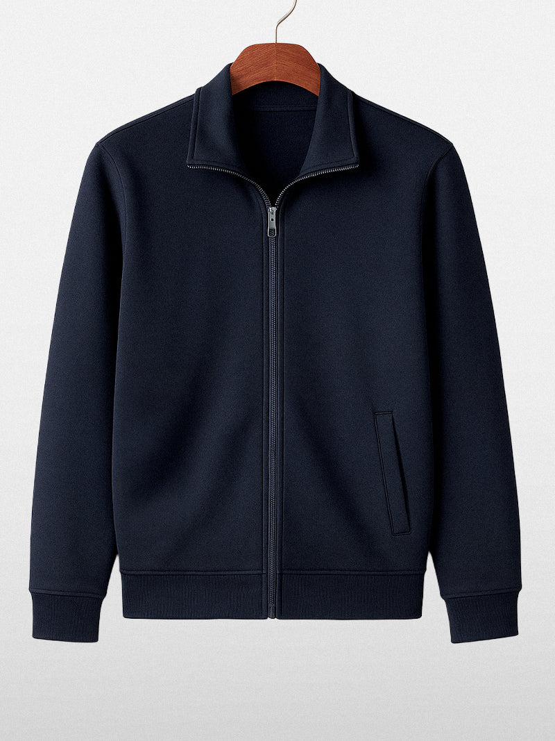 Navy blue zip-up sweater with stand-up collar and soft knit lining — midweight layer designed for quiet structure and modern elegance.