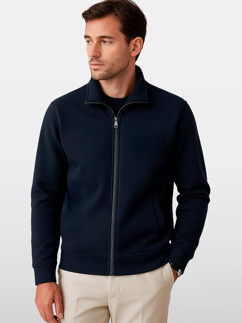Navy blue zip-up sweater with stand-up collar and soft knit lining — midweight layer designed for quiet structure and modern elegance.