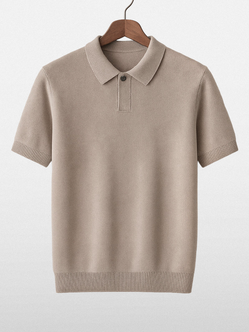 Apricot short sleeve polo with ribbed cuffs and compact knit — warm neutral tone with elegant fit.