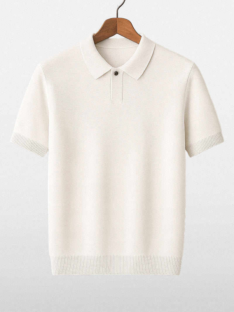 White slim-fit polo shirt with ribbed sleeves and compact knit — lightweight structure with silent presence.
